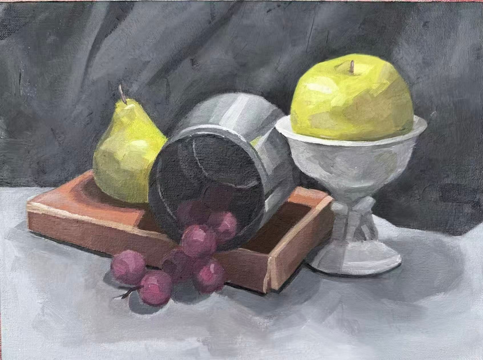 Acrylic painting of a still life: a yellow-green pear on a shallow wooden tray, a silver metal cup lying on its side with red grapes spilling out in front, and a large green apple resting in a white footed bowl, all on a pale grey cloth before a dark grey draped background.